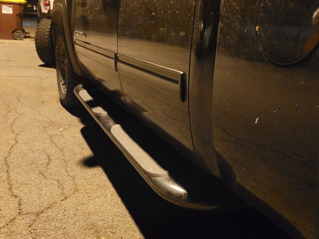 Barricade 4-Inch Oval Bent End Side Step Bars; Body Mount; Black (99-13 Silverado 1500)