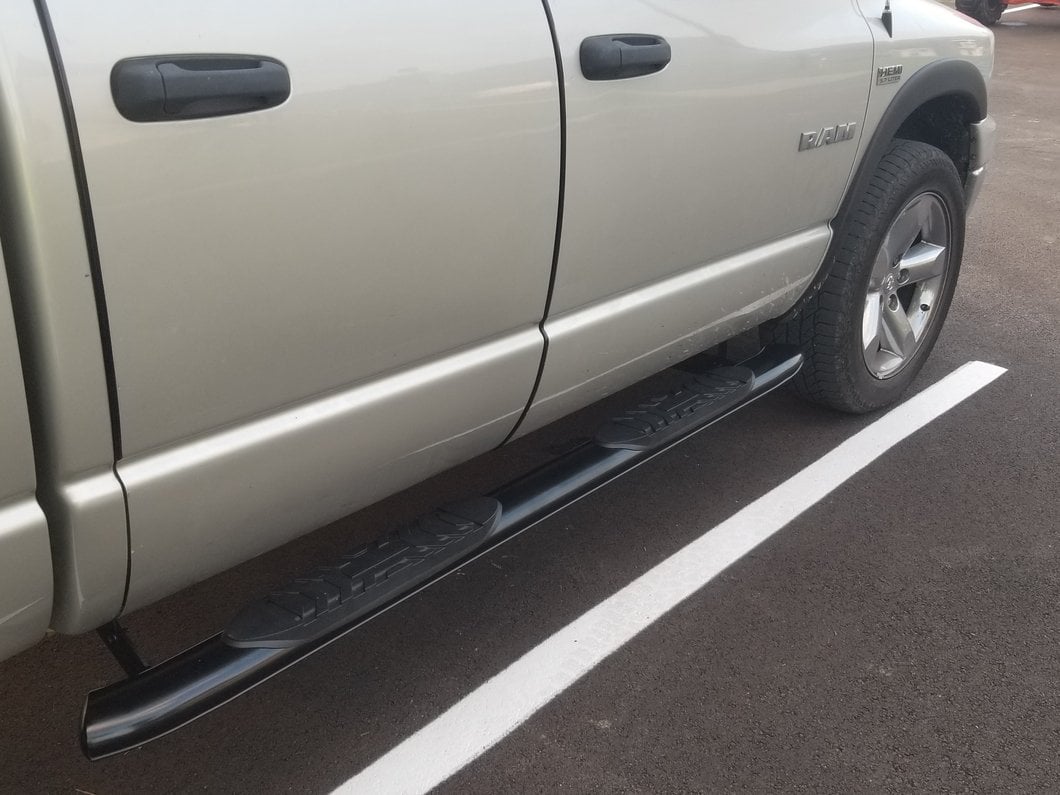 Barricade 5-Inch Oval Bent End Side Step Bars; Black (02-08 RAM 1500 Quad Cab)