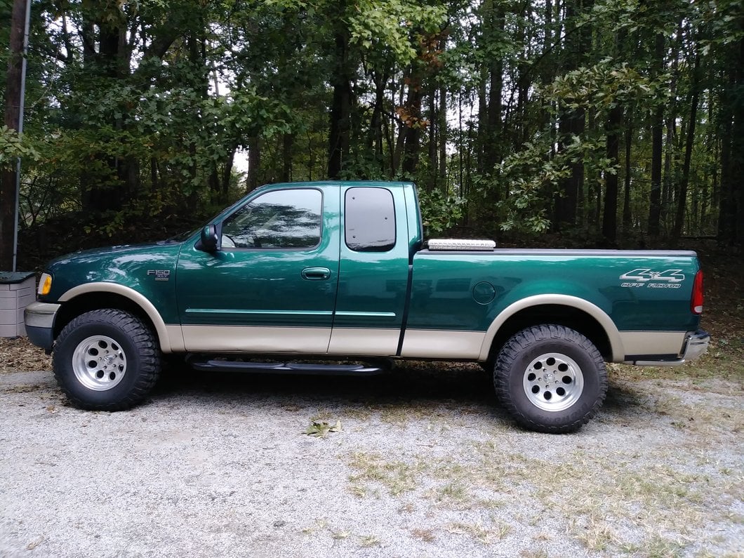 Barricade 4-Inch Oval Bent End Side Step Bars; Gloss Black (97-03 F-150)