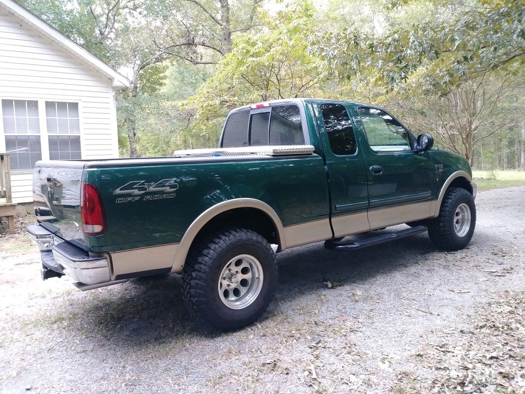 Barricade 4-Inch Oval Bent End Side Step Bars; Gloss Black (97-03 F-150)