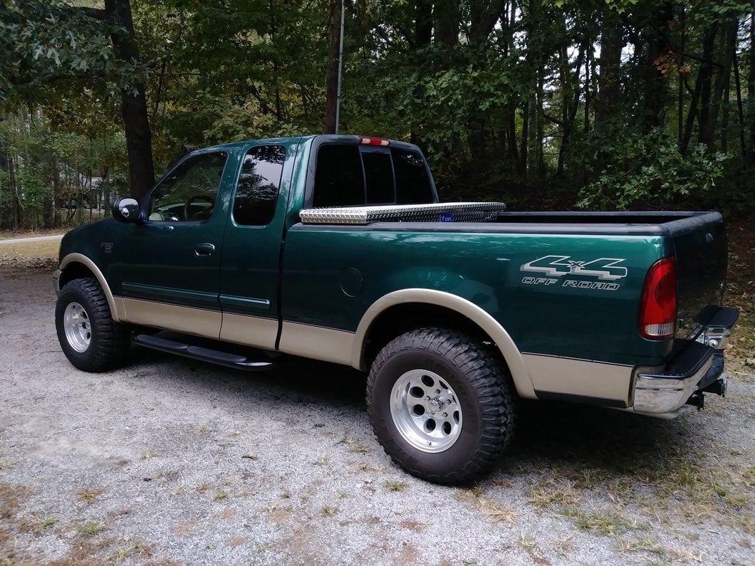 Barricade 4-Inch Oval Bent End Side Step Bars; Gloss Black (97-03 F-150)