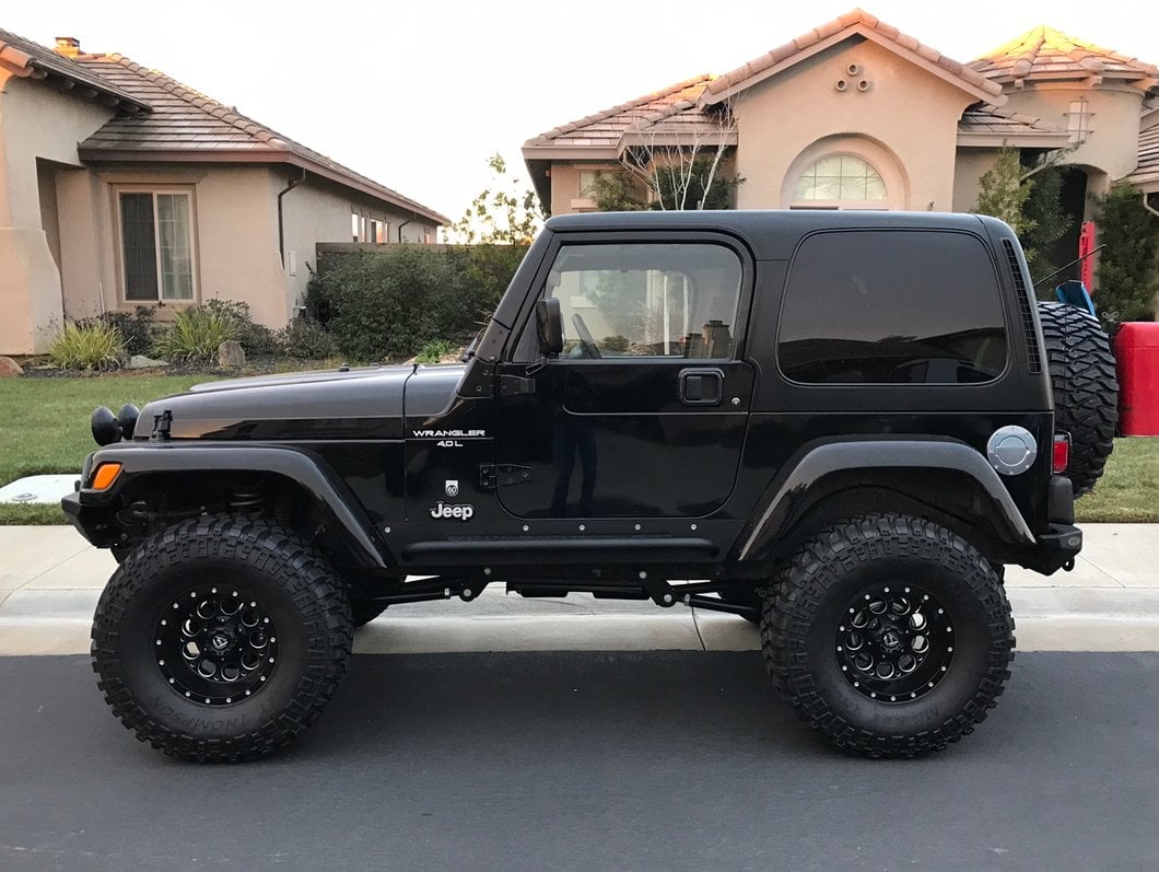 Barricade Rocker Guards with Steps (97-06 Jeep Wrangler TJ, Excluding Unlimited)