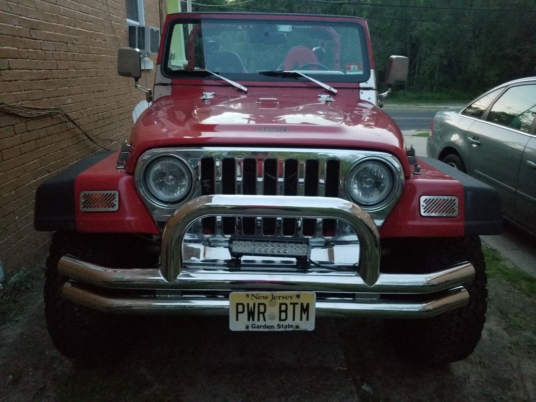 Barricade Double Tubular Front Bumper with Classic Over-Rider Hoop; Polished (76-06 Jeep CJ, Wrangler YJ & TJ)