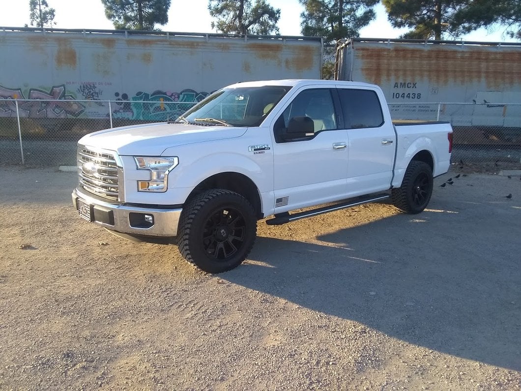 Barricade 5-Inch Oval Bent End Wheel to Wheel Side Step Bars; Black (15-25 F-150 SuperCab, SuperCrew)