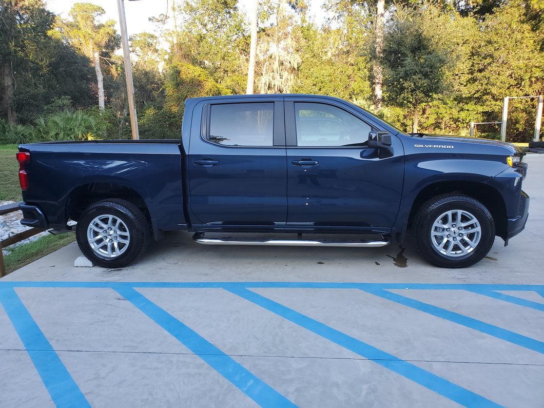 Barricade 4-Inch Oval Bent End Side Step Bars; Stainless Steel (19-25 Silverado 1500 Crew Cab)