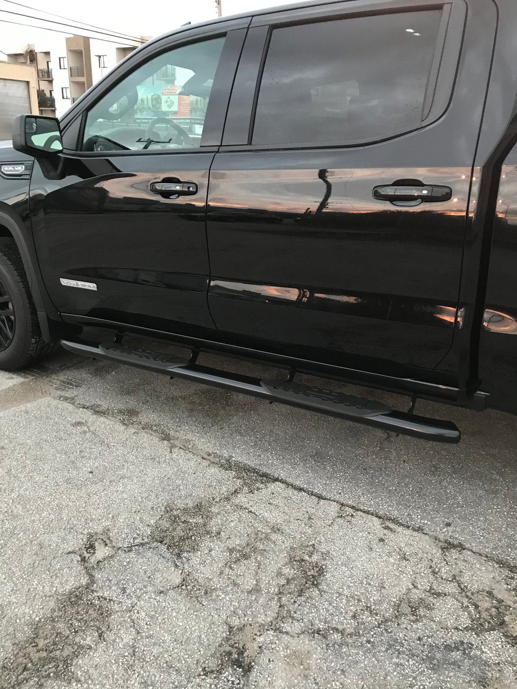 Barricade 5-Inch Oval Bent End Side Step Bars; Black (19-25 Sierra 1500 Crew Cab)