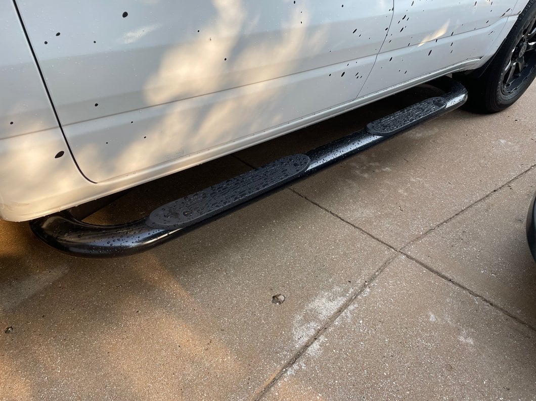 Barricade 4-Inch Oval Bent End Side Step Bars; Black (19-25 RAM 1500 Crew Cab)