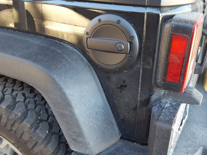 Barricade Locking Fuel Door; Textured Black (07-18 Jeep Wrangler JK)