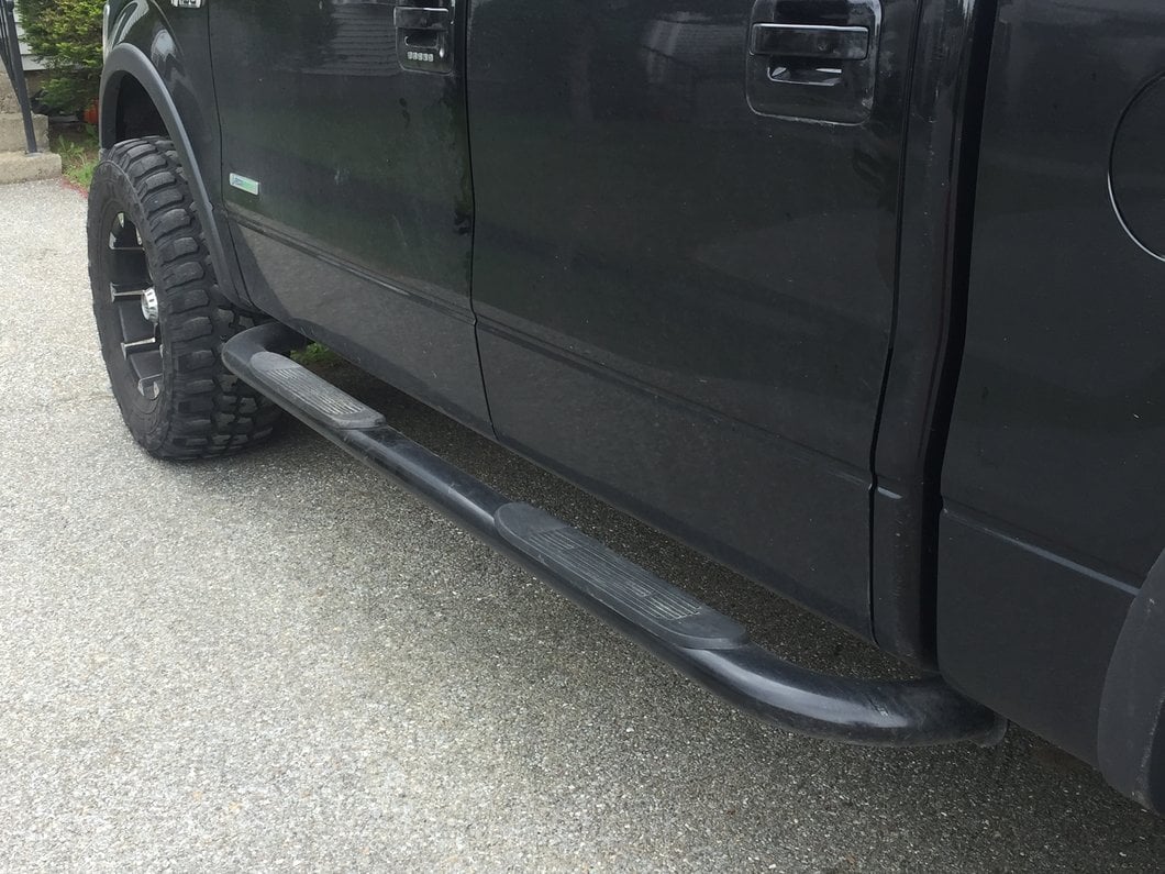 Barricade 4-Inch Oval Curved Side Step Bars; Gloss Black (09-14 F-150)