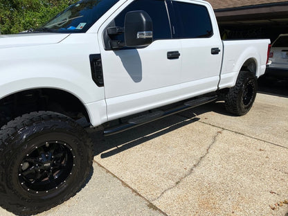 Barricade 5-Inch Oval 60 Degree Bent End Side Step Bars; Black (17-25 F-250 Super Duty SuperCrew)